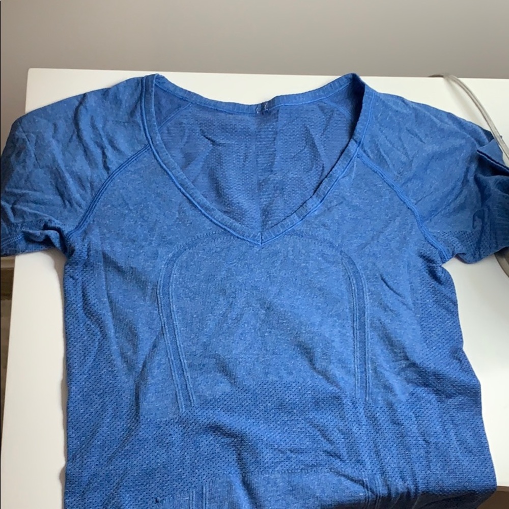 Lululemon blue workout shirt size 4 blue.
